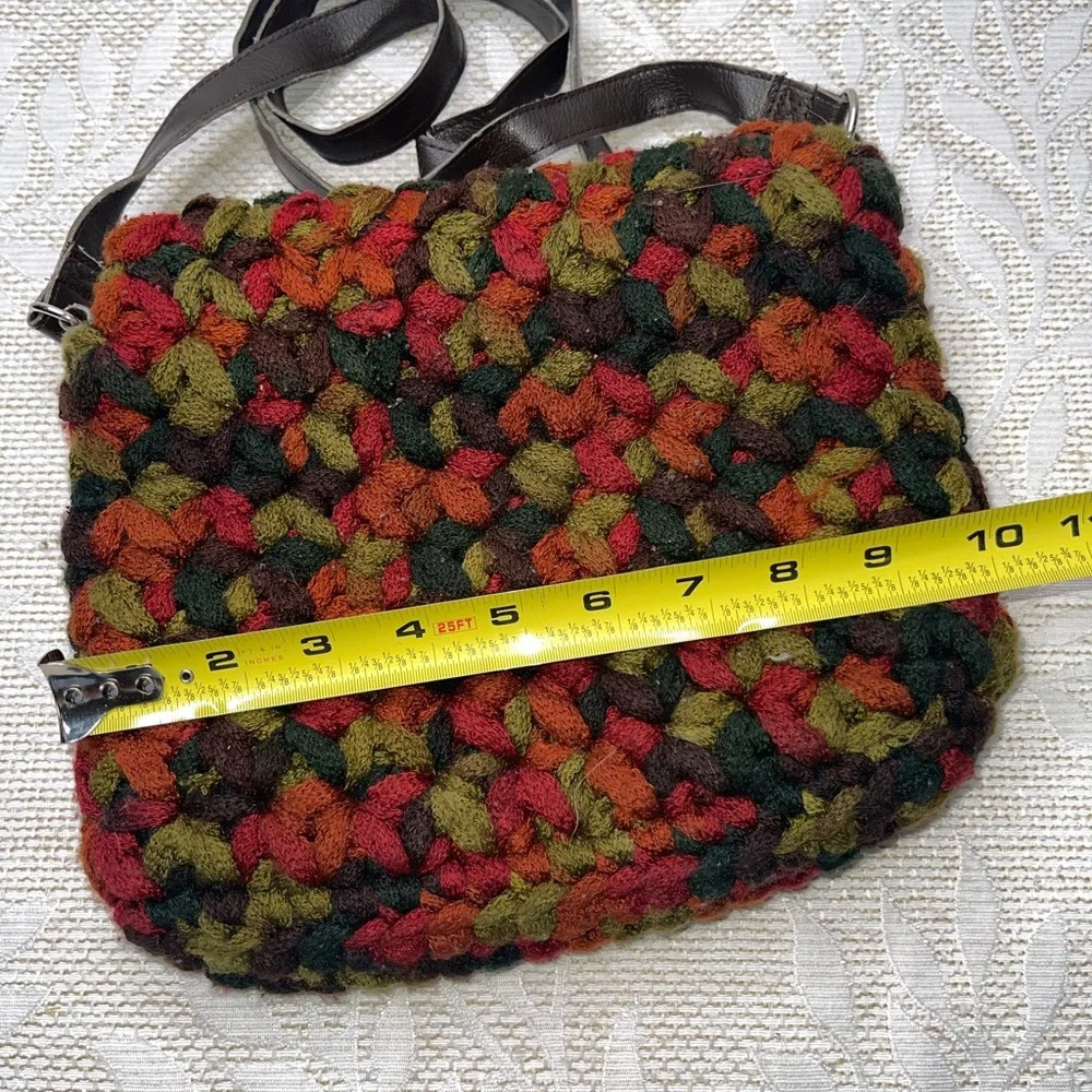 crossbody bag made with funky chunky, variegated yarn toggle closure